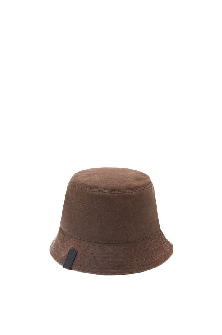 Reversible bucket hat in waxed canvas and tartan
