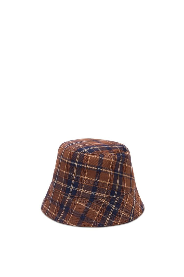 Reversible bucket hat in waxed canvas and tartan