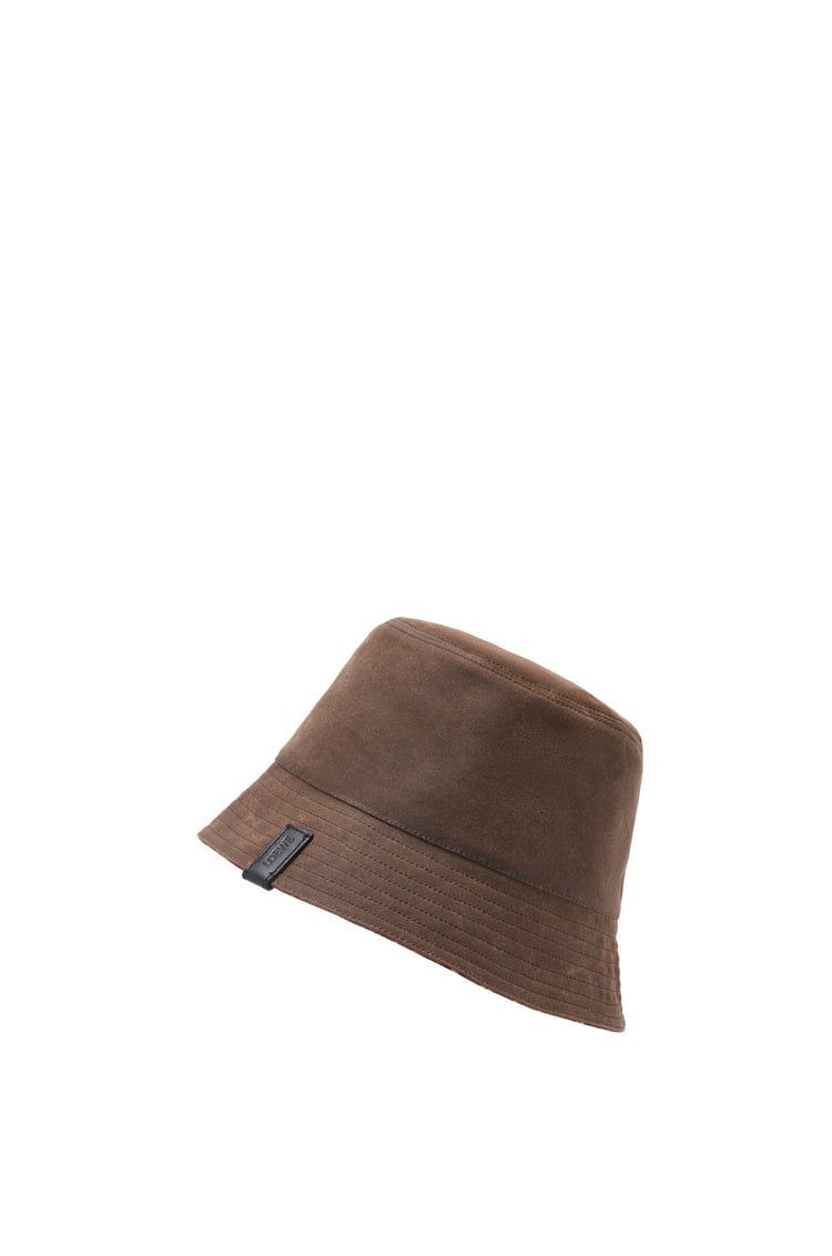 Reversible bucket hat in waxed canvas and tartan