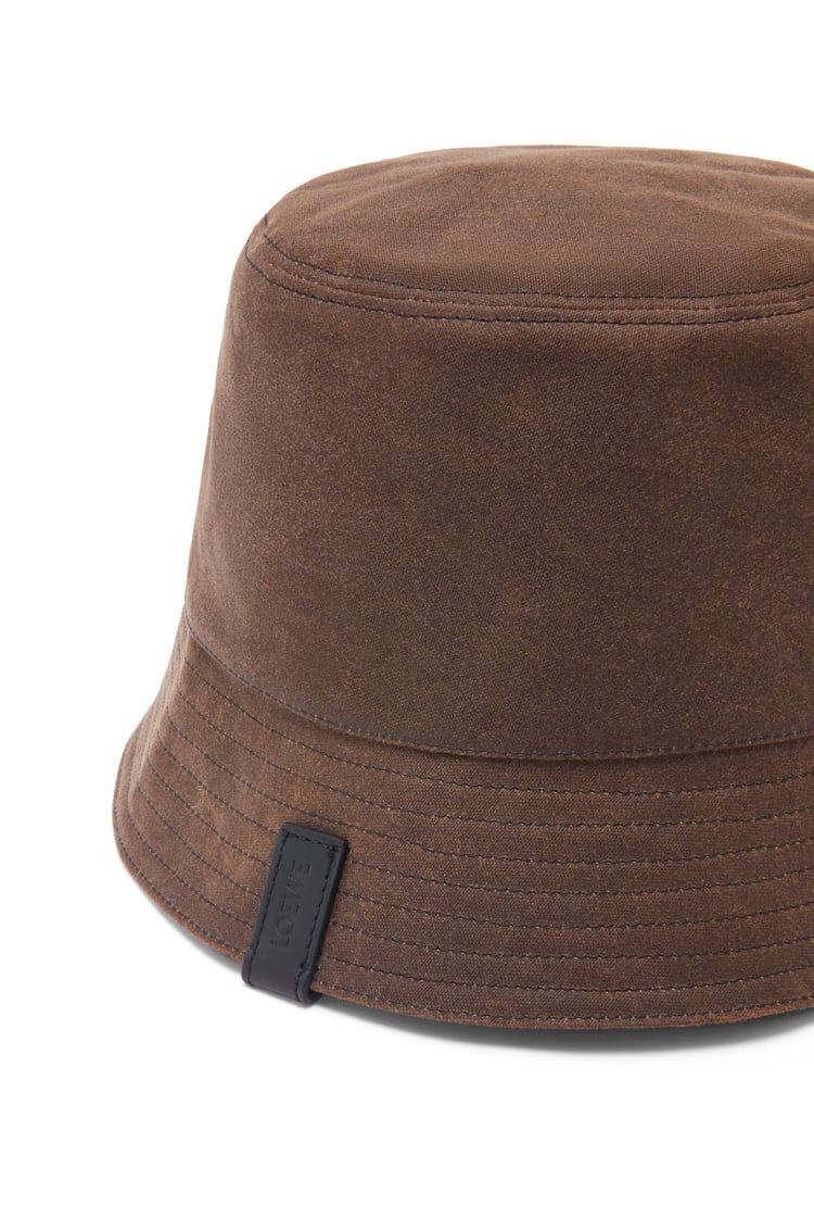Reversible bucket hat in waxed canvas and tartan
