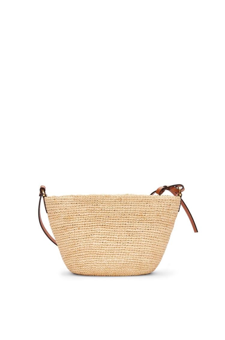 Slit Pochette bag in raffia and calfskin