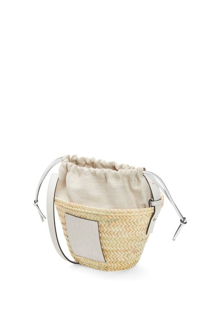 Drawstring bucket bag in palm leaf and calfskin
