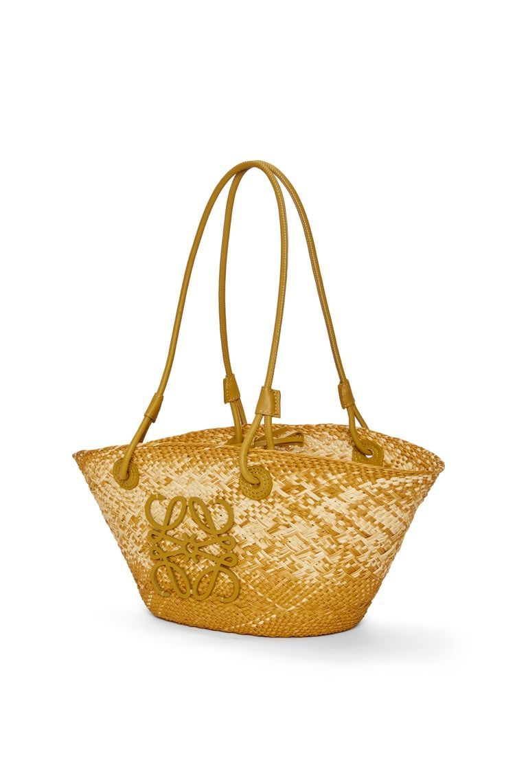 Small Anagram basket bag in iraca palm and calfskin