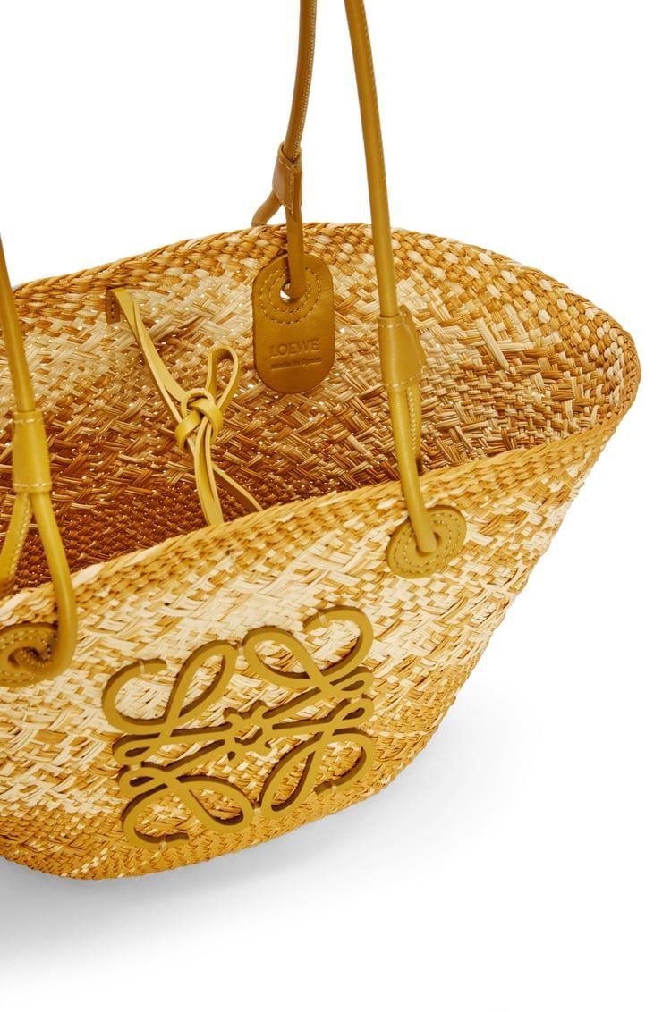 Small Anagram basket bag in iraca palm and calfskin