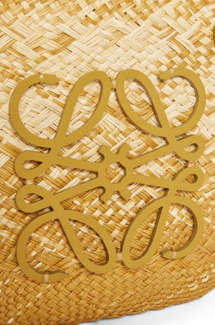 Small Anagram basket bag in iraca palm and calfskin