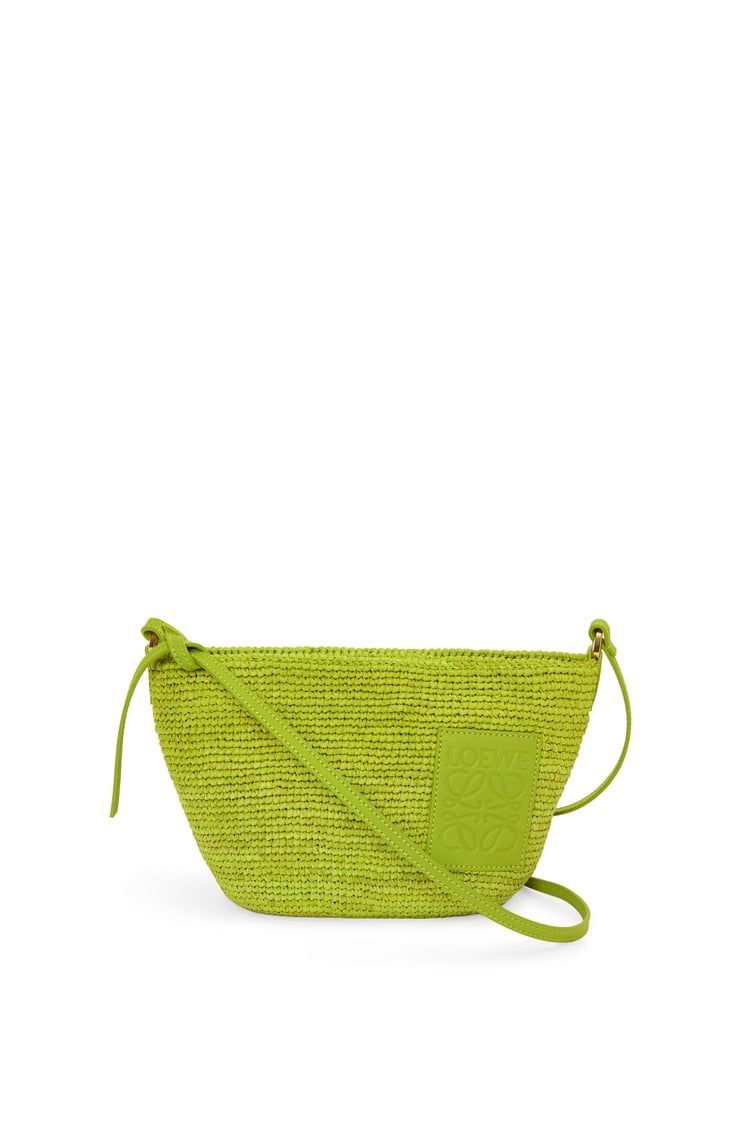 Slit Pochette bag in raffia and calfskin