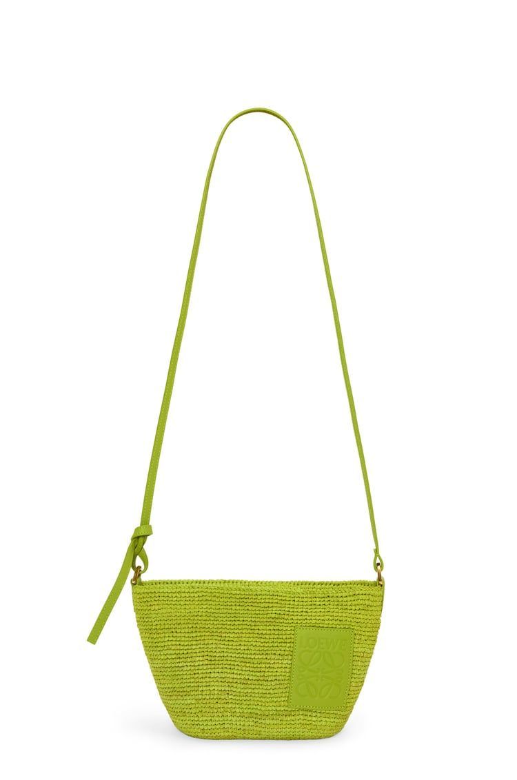 Slit Pochette bag in raffia and calfskin