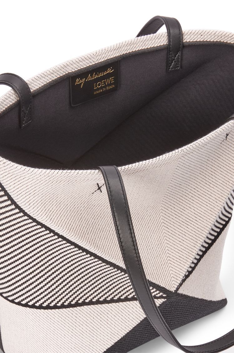 Medium Puzzle Fold tote in canvas jacquard and calfskin