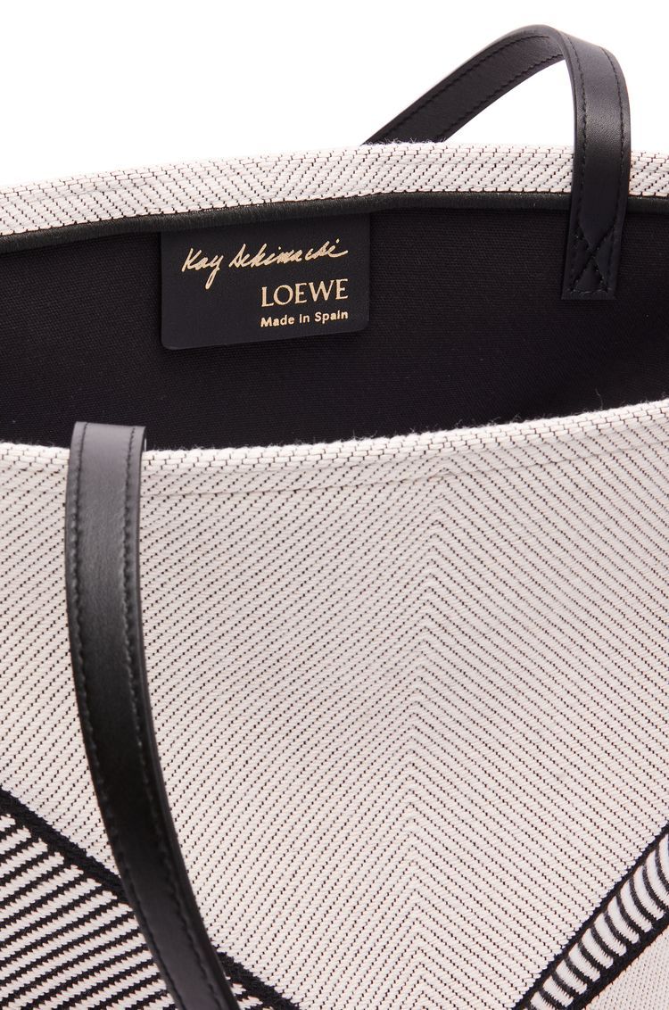Medium Puzzle Fold tote in canvas jacquard and calfskin