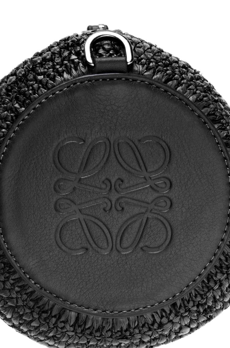 Bracelet pouch in raffia and calfskin