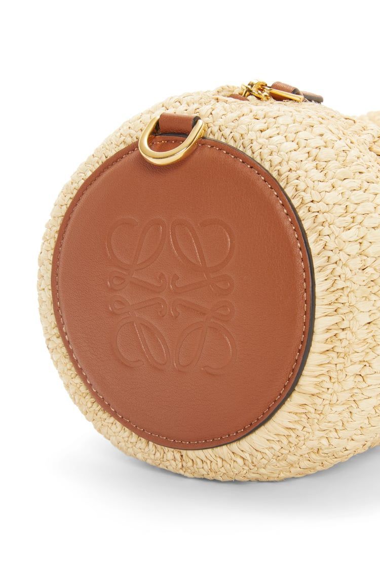 Bracelet pouch in raffia and calfskin