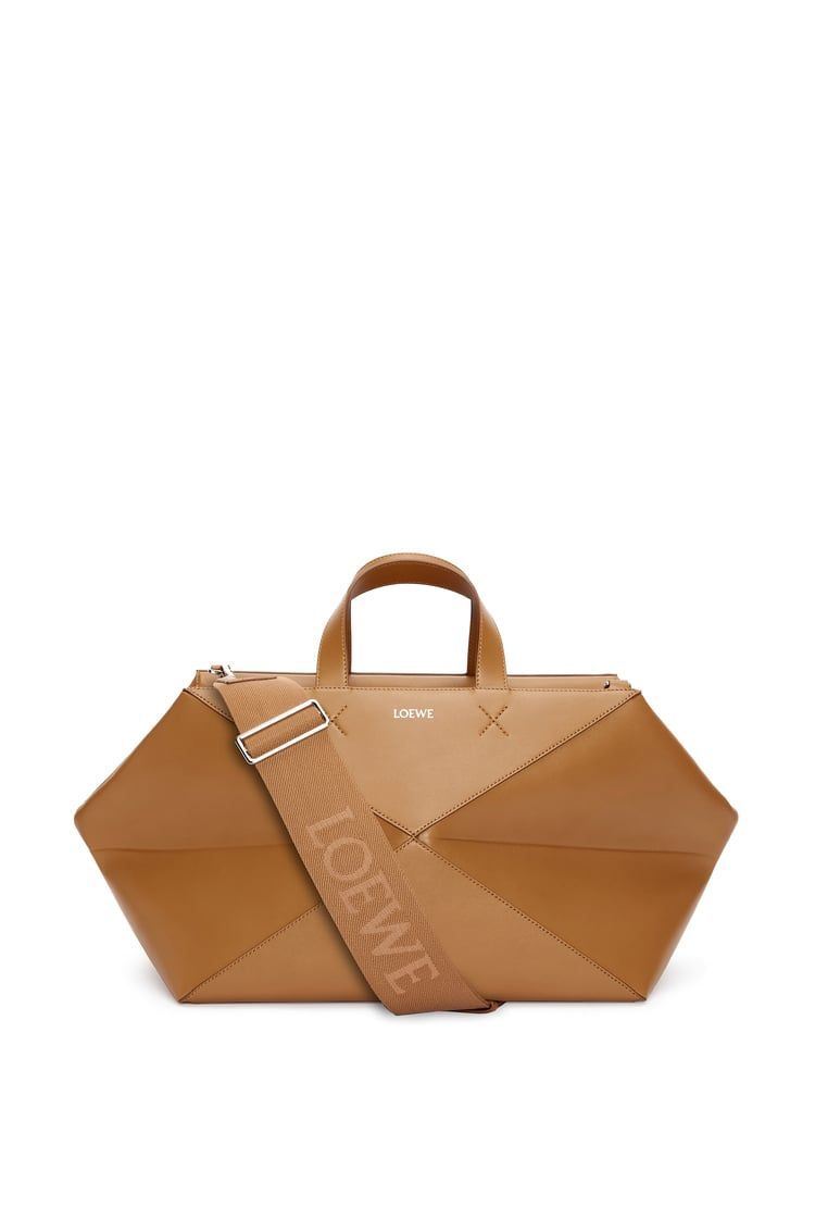 Medium Puzzle Fold duffle in shiny calfskin