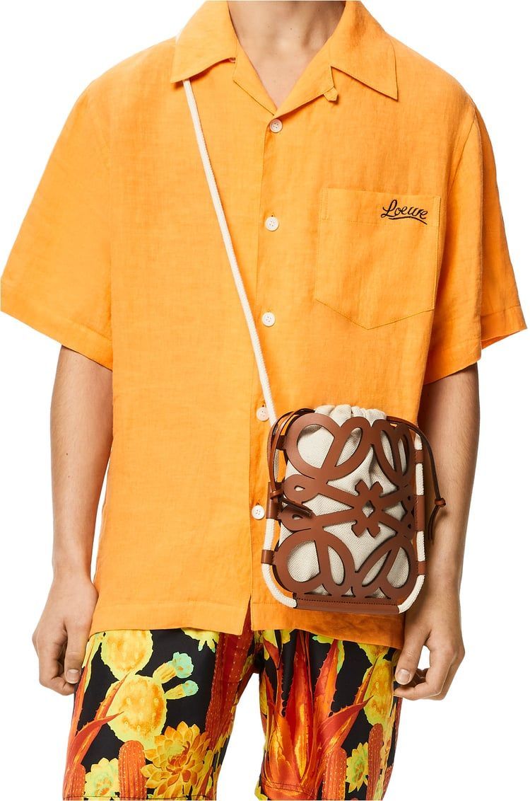 Anagram cut-out crossbody in classic calfskin and canvas