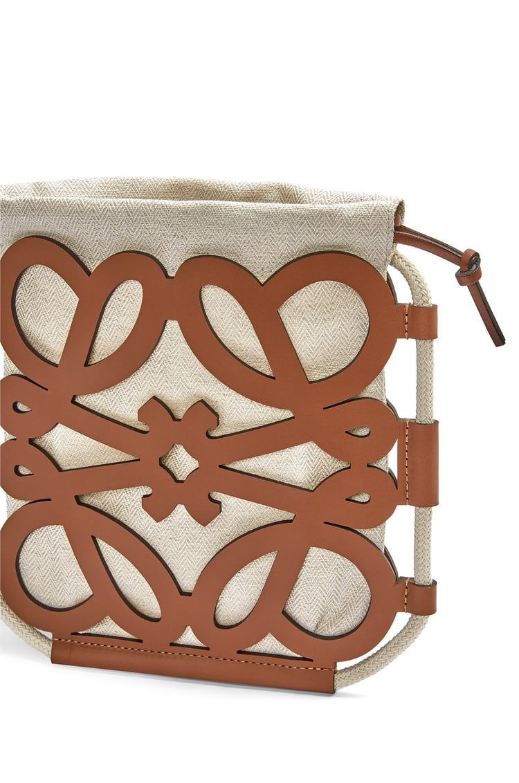 Anagram cut-out crossbody in classic calfskin and canvas