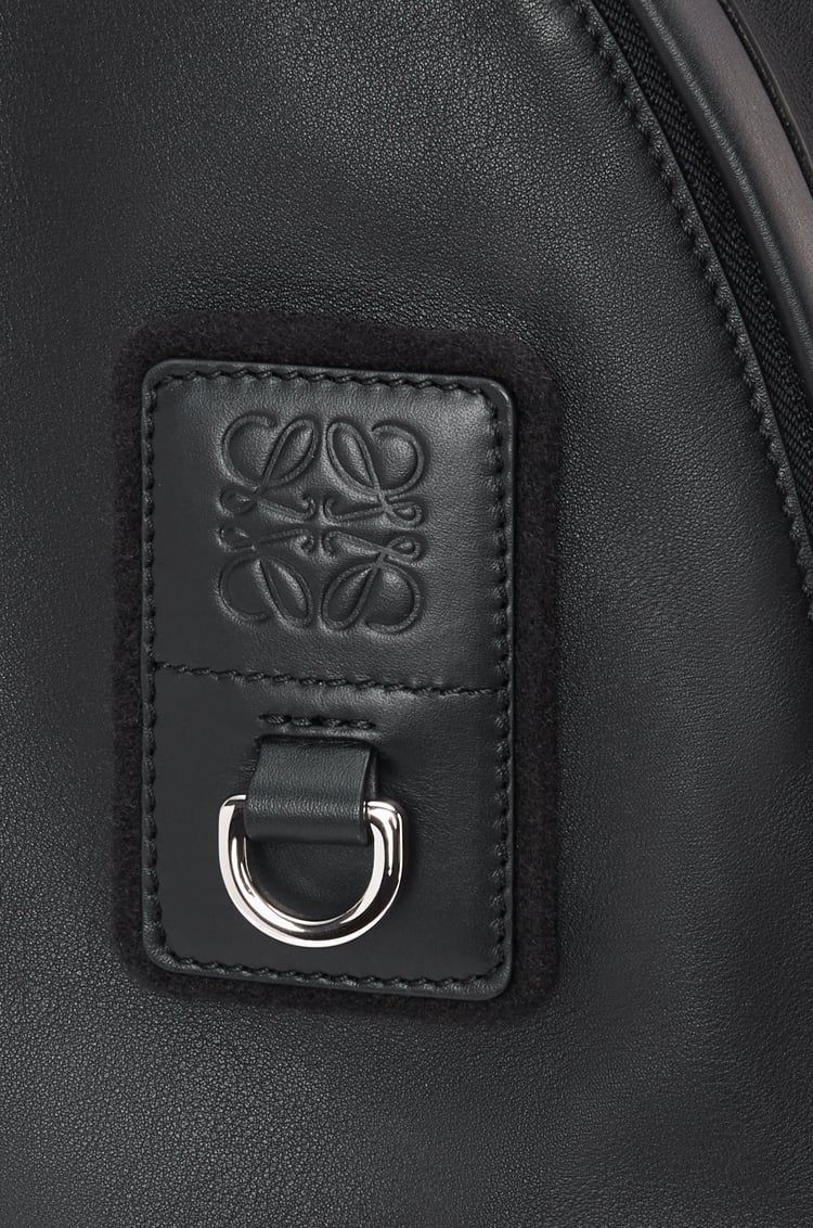 Round Slim Backpack in calfskin and Anagram jacquard