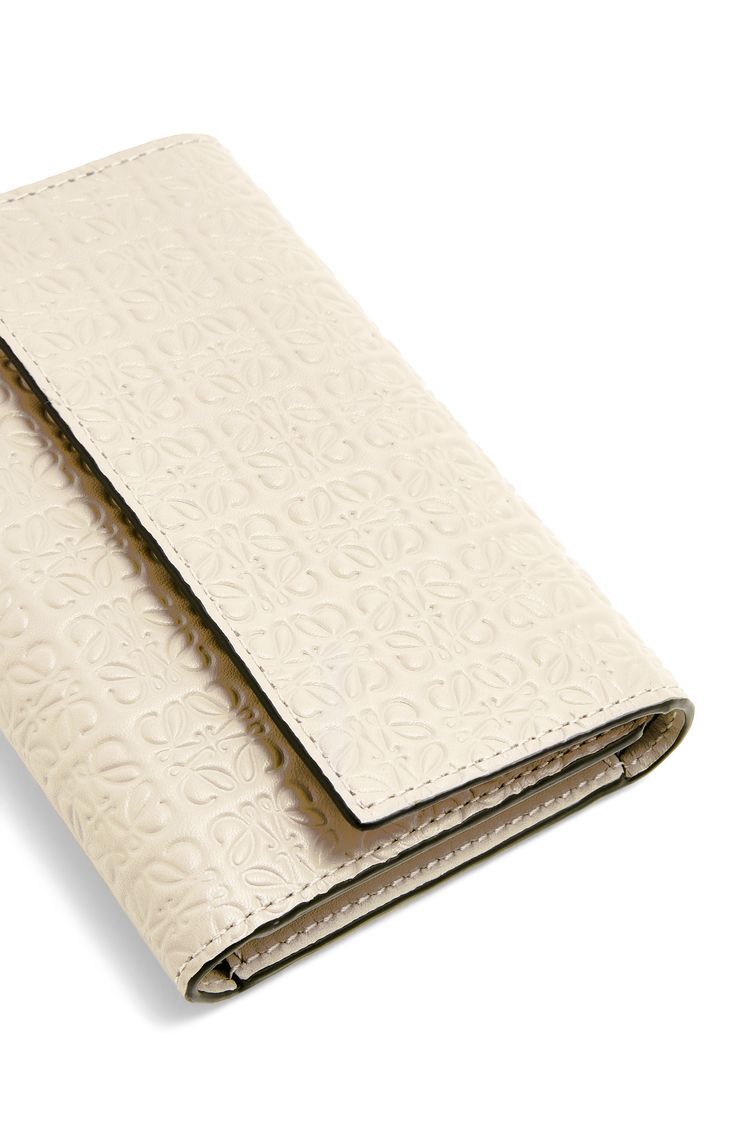 Repeat small vertical wallet in embossed silk calfskin