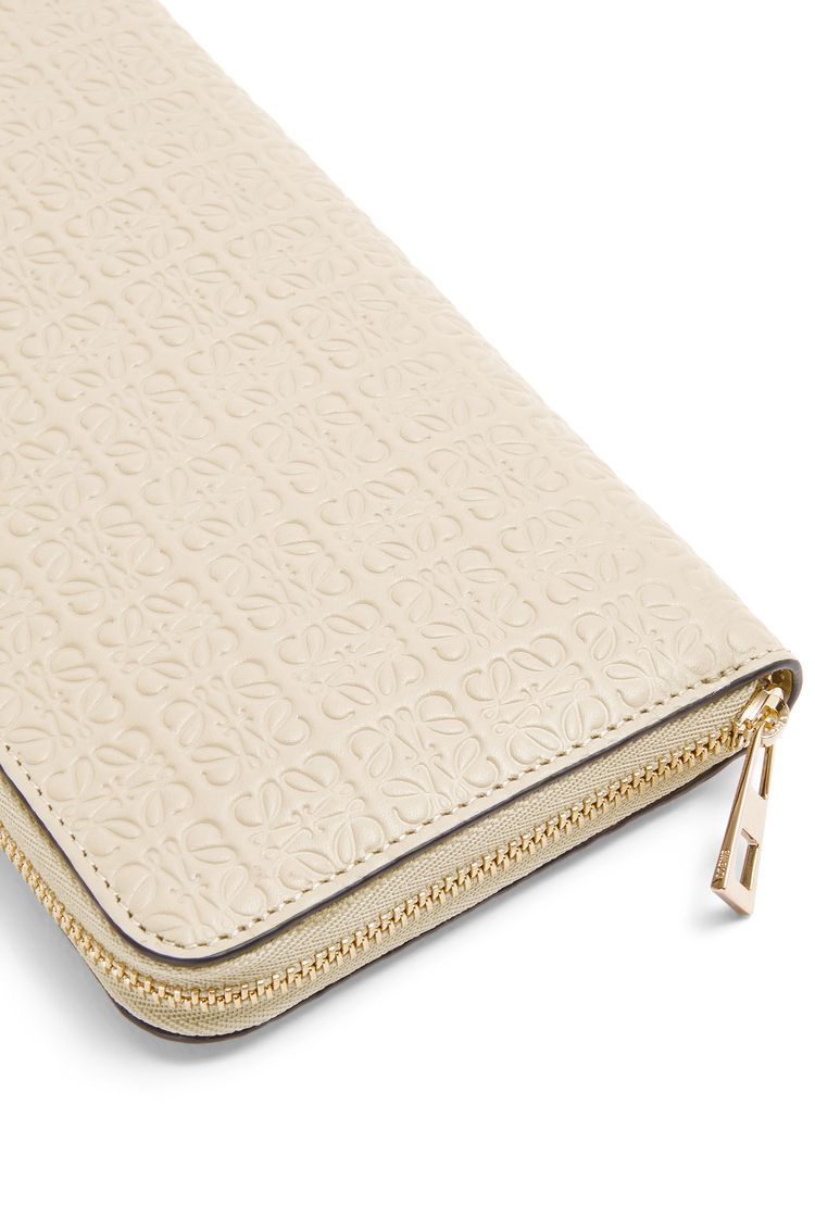 Repeat zip around wallet in embossed silk calfskin