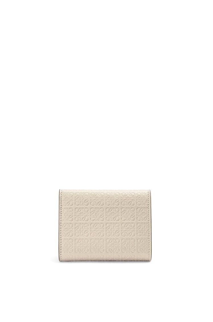Repeat trifold wallet in embossed silk calfskin