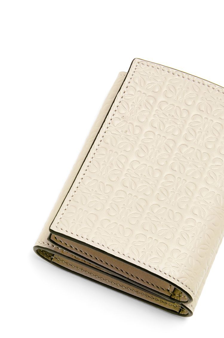 Repeat trifold wallet in embossed silk calfskin