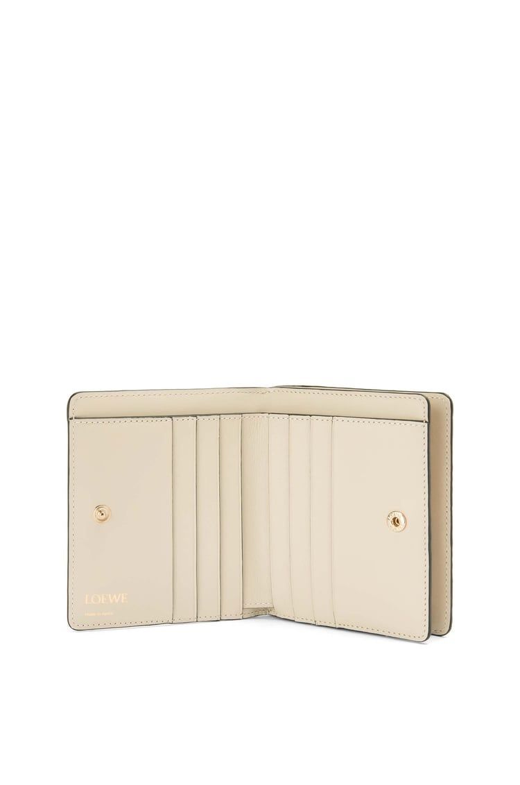 Repeat compact zip wallet in embossed silk calfskin
