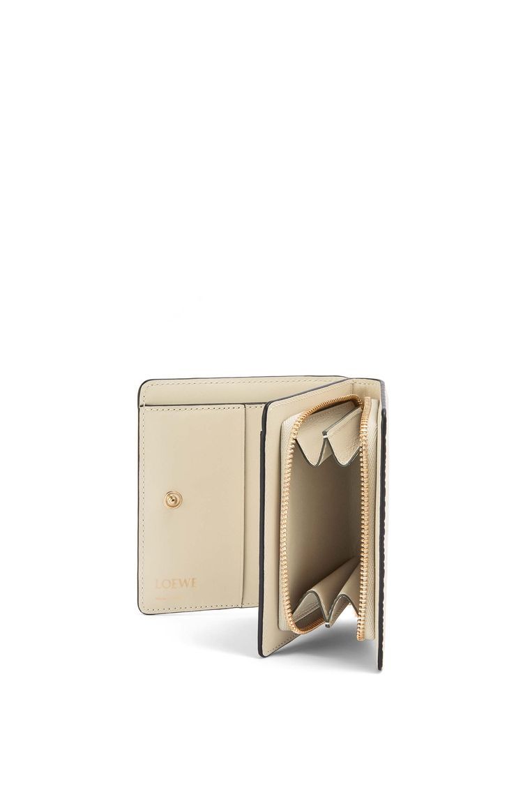 Repeat compact zip wallet in embossed silk calfskin