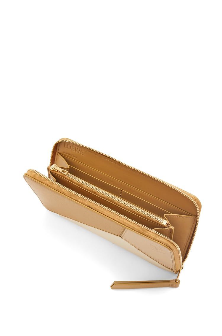 Puzzle zip around wallet in calfskin