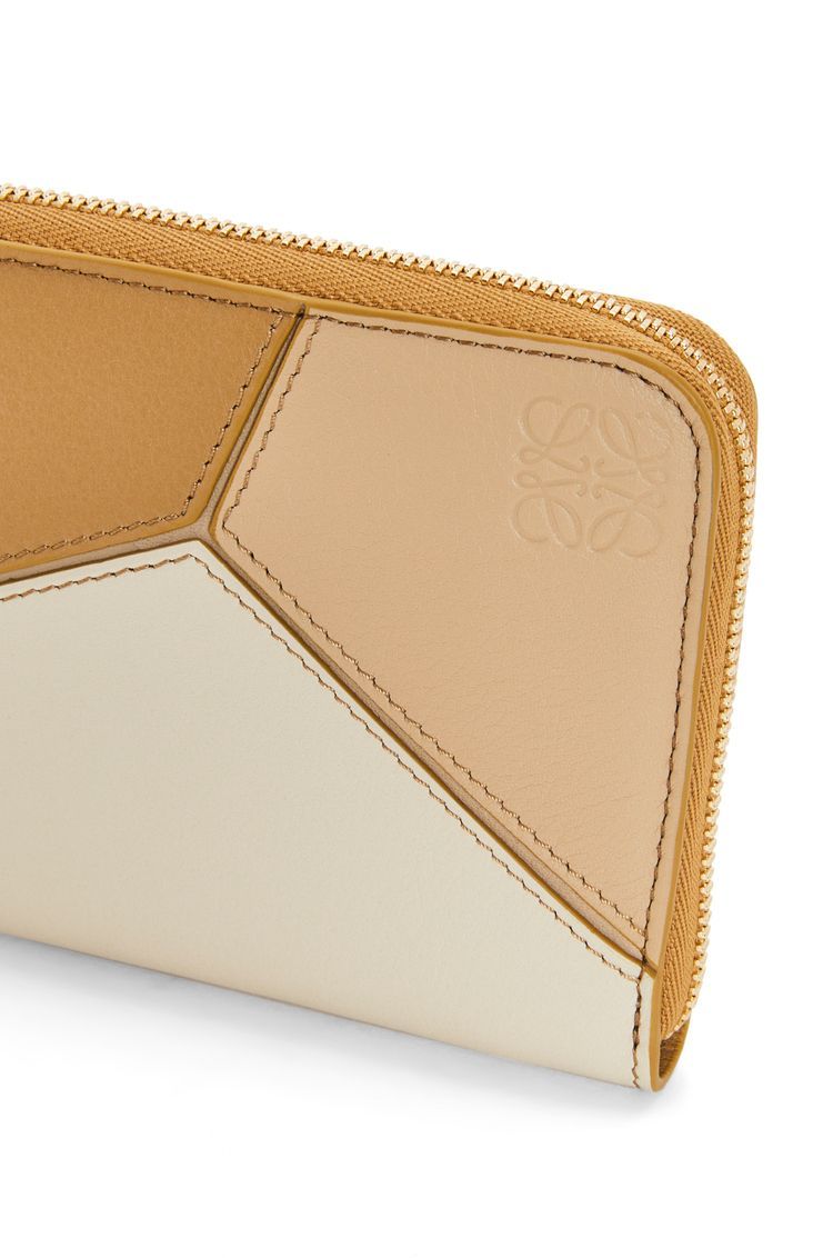 Puzzle zip around wallet in calfskin