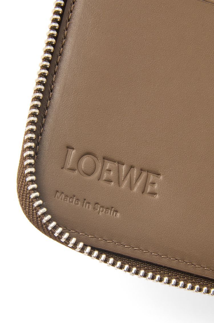 Puzzle zipped open wallet in classic calfskin