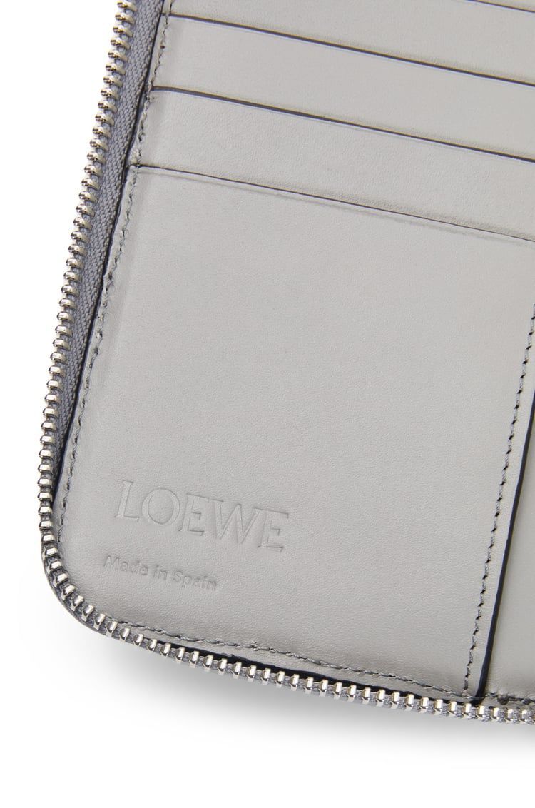 Puzzle zipped open wallet in classic calfskin