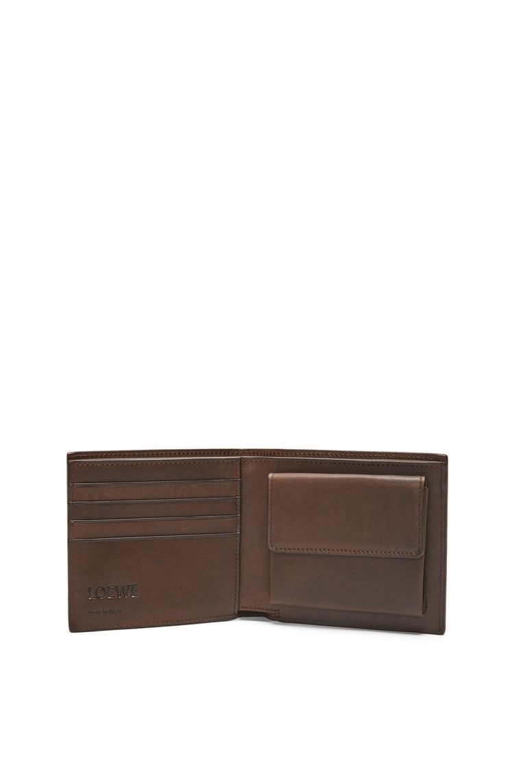 Bifold coin wallet in vegetable-tanned calfskin