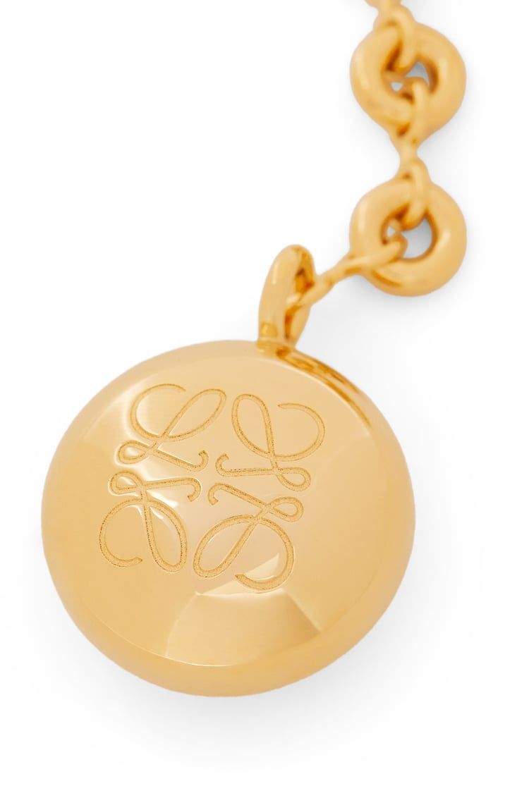 Pebble keyring in brass