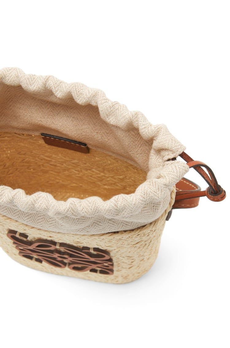 Square pocket in iraca palm and calfskin
