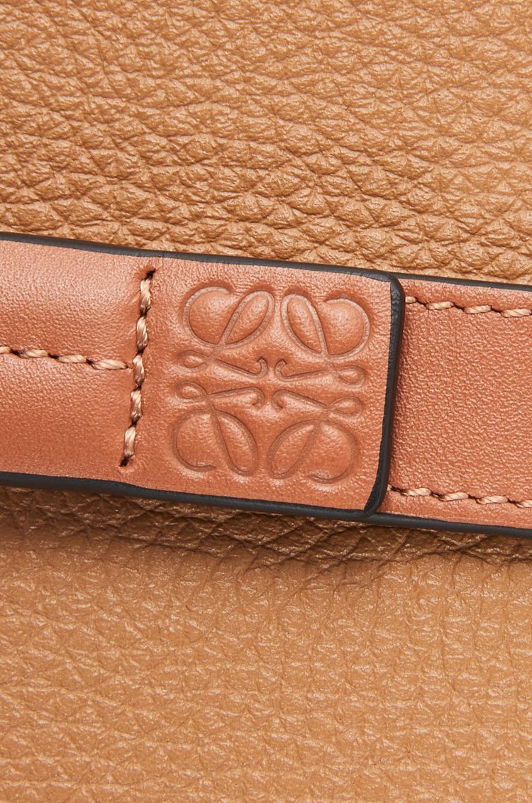 Medium vertical wallet in soft grained calfskin