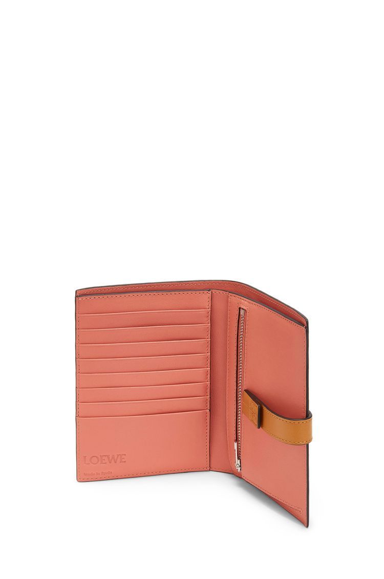Medium vertical wallet in soft grained calfskin