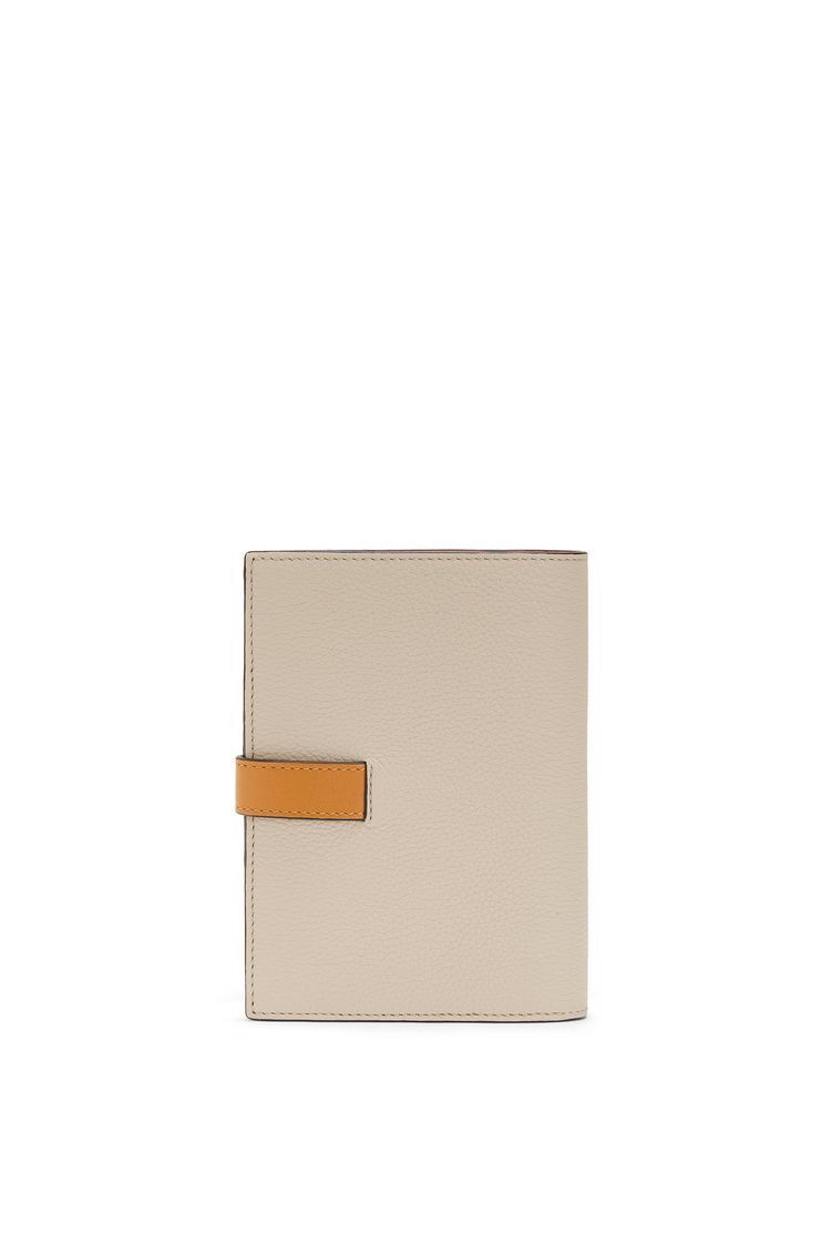Medium vertical wallet in soft grained calfskin