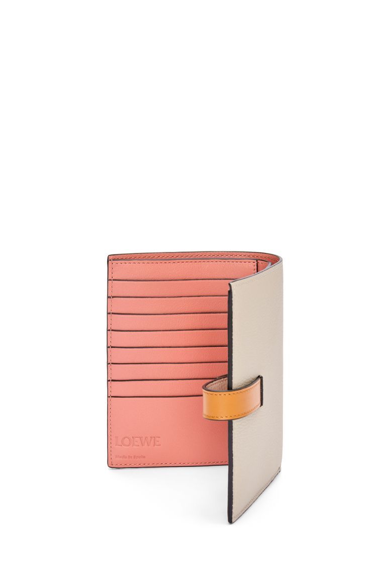 Medium vertical wallet in soft grained calfskin
