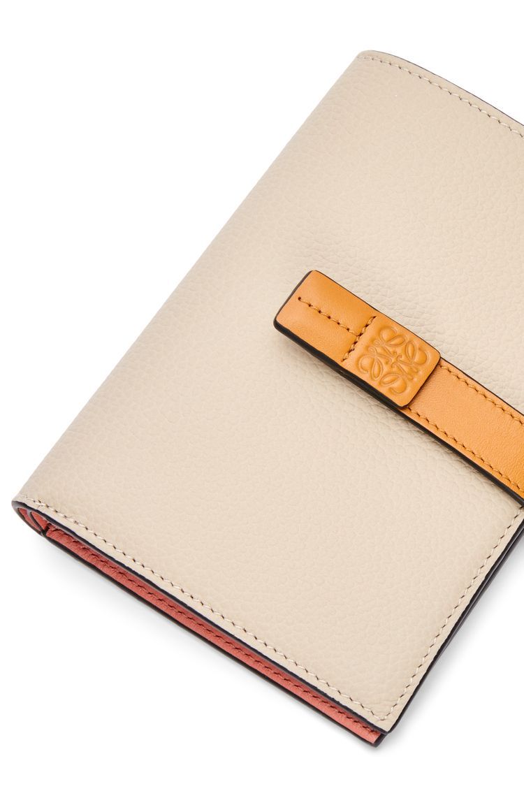 Medium vertical wallet in soft grained calfskin