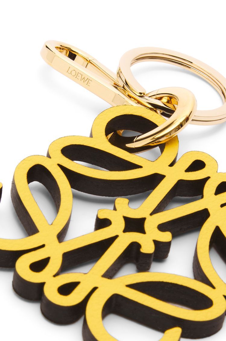 Anagram charm in calfskin