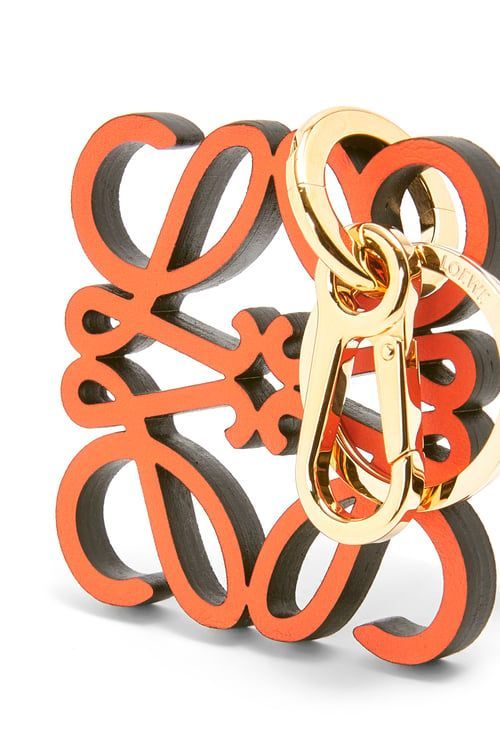 Anagram charm in calfskin