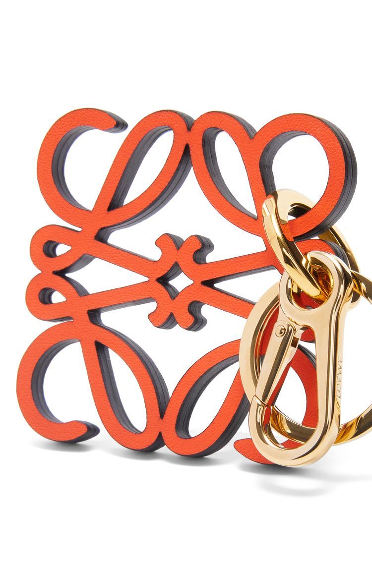 Anagram charm in calfskin