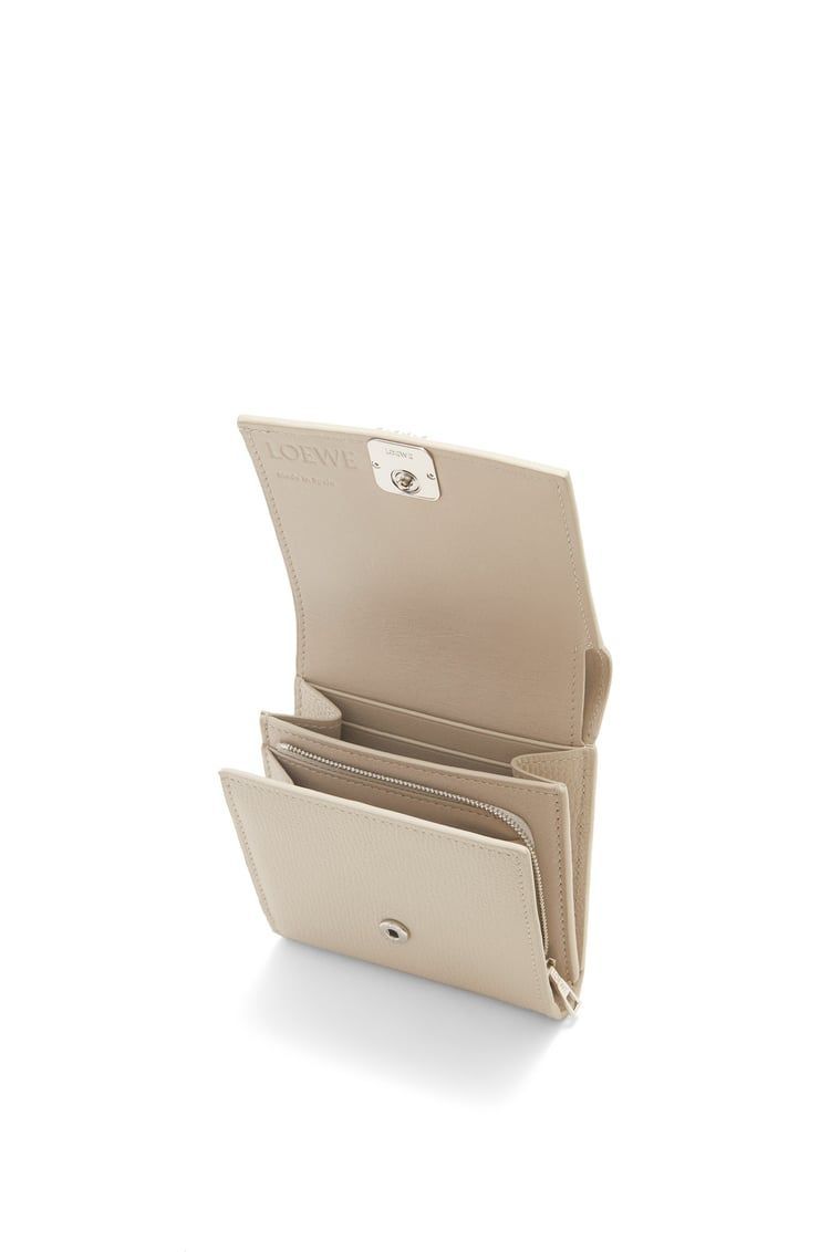 Anagram compact flap wallet in pebble grain calfskin