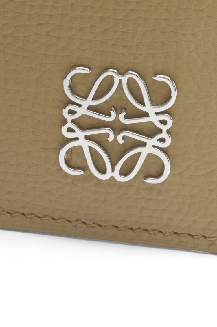 Anagram square cardholder in pebble grain calfskin with chain