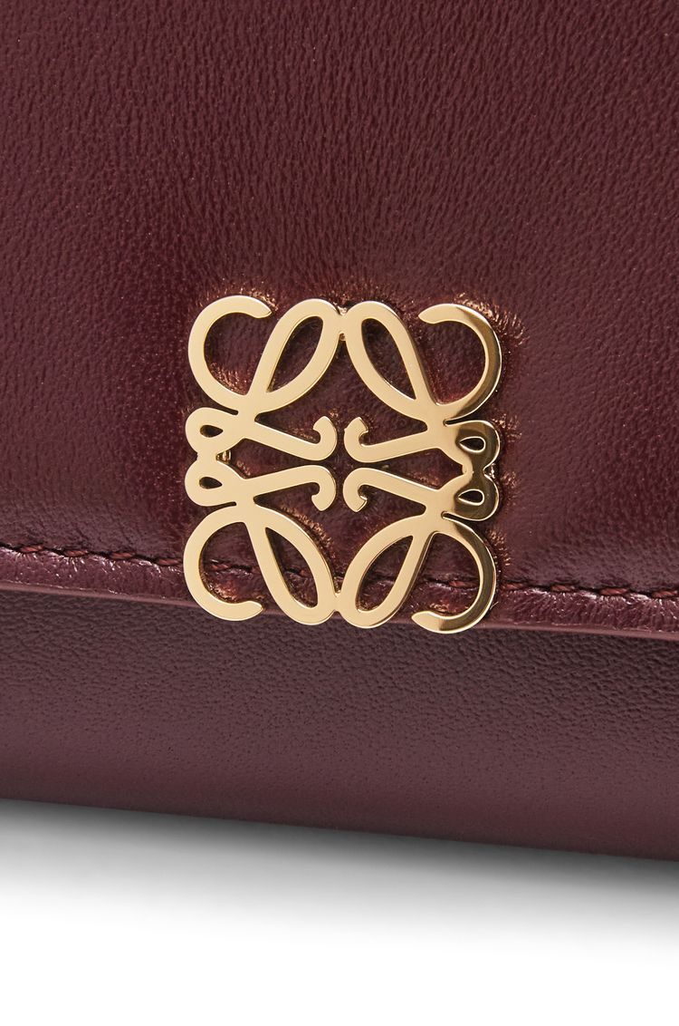 Puffer Anagram small vertical wallet in shiny nappa calfskin