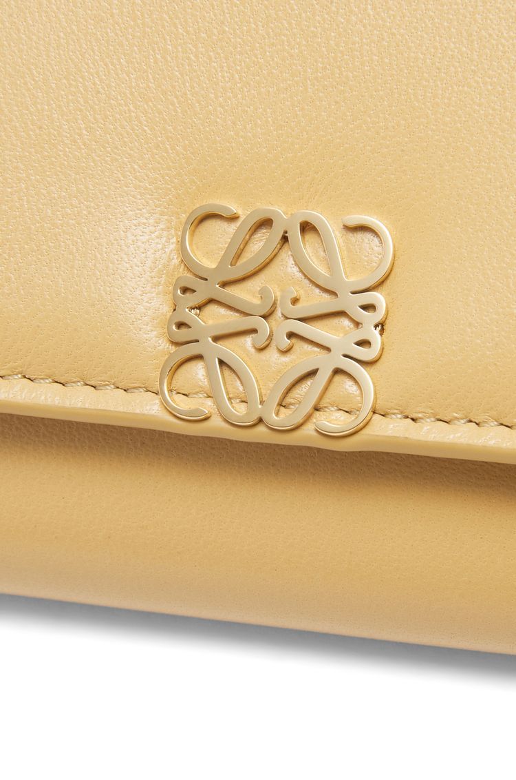 Puffer Anagram small vertical wallet in shiny nappa calfskin