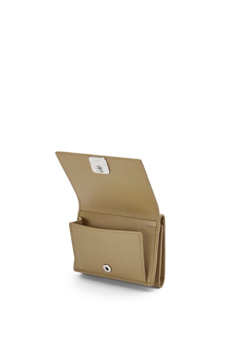 Anagram trifold wallet in pebble grain calfskin