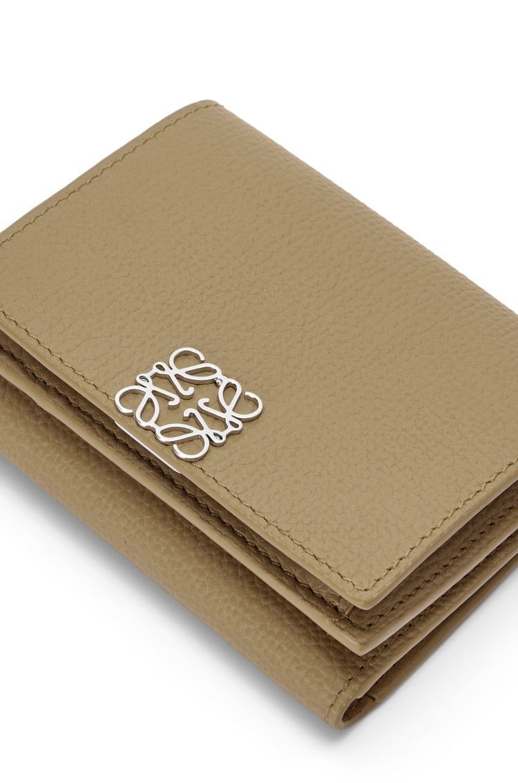 Anagram trifold wallet in pebble grain calfskin