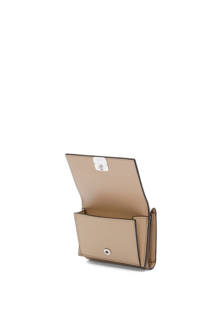 Anagram trifold wallet in pebble grain calfskin