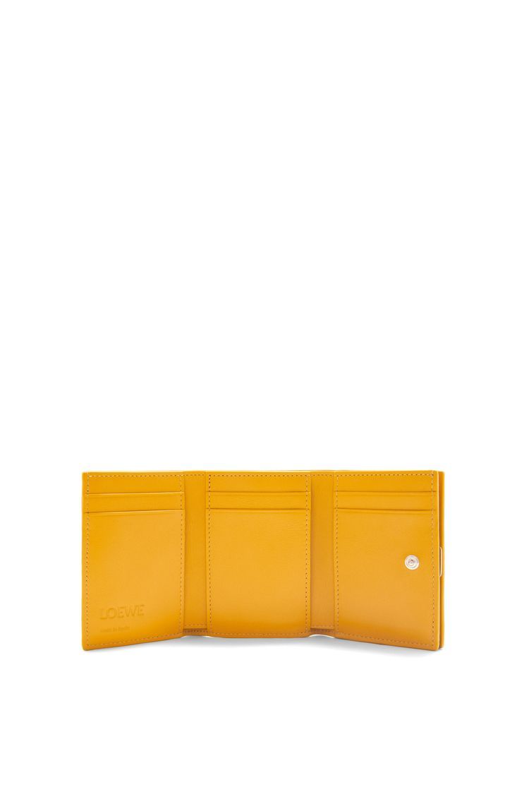 Anagram trifold wallet in pebble grain calfskin