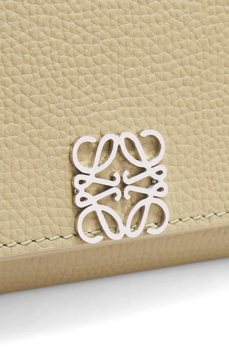 Anagram trifold wallet in pebble grain calfskin
