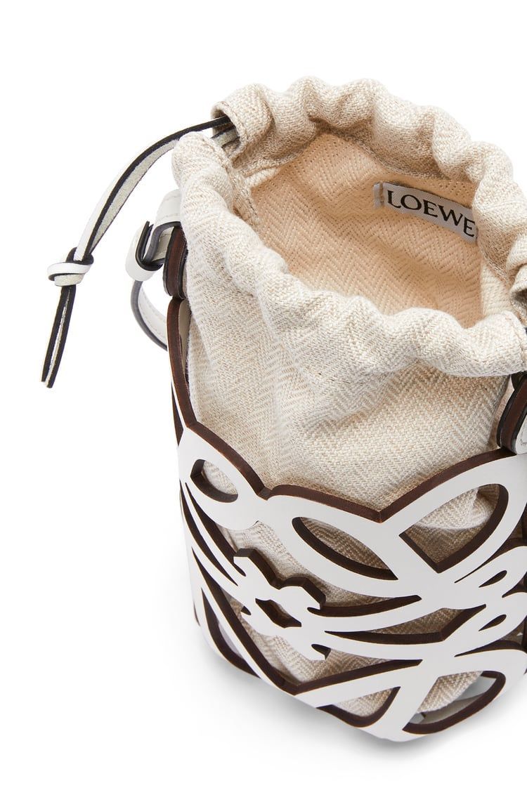Anagram cut-out pocket in classic calfskin and canvas